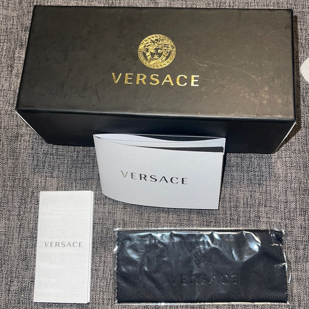 Authentic Versace box (case not included).